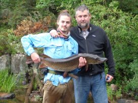 father and son caught fish